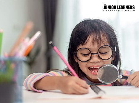 student having fun while learning in a tuition learning centre